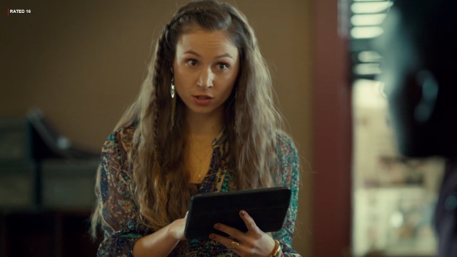 Waverly holding a tablet.